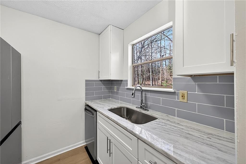 5225 Forest Downs Ln S Atlanta, GA 30349  | Single Family