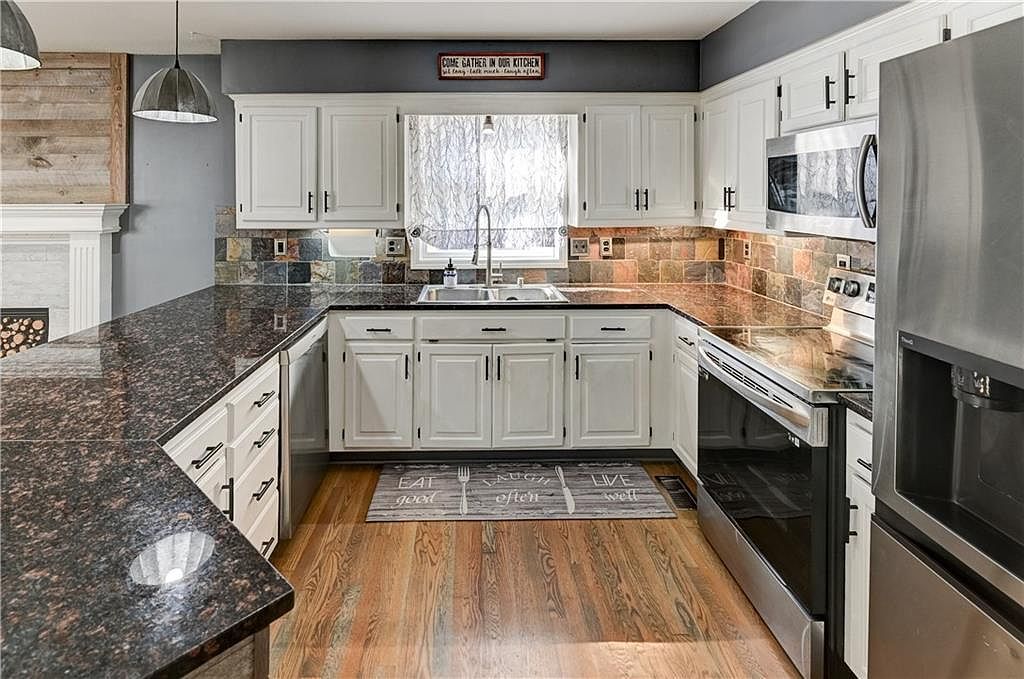 1005 NE Scenic Ct Lees Summit, MO 64064  | Single Family