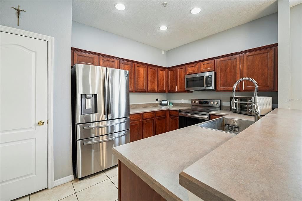7105 Red Lantern Dr #13C Harmony, FL 34773  | Condominium