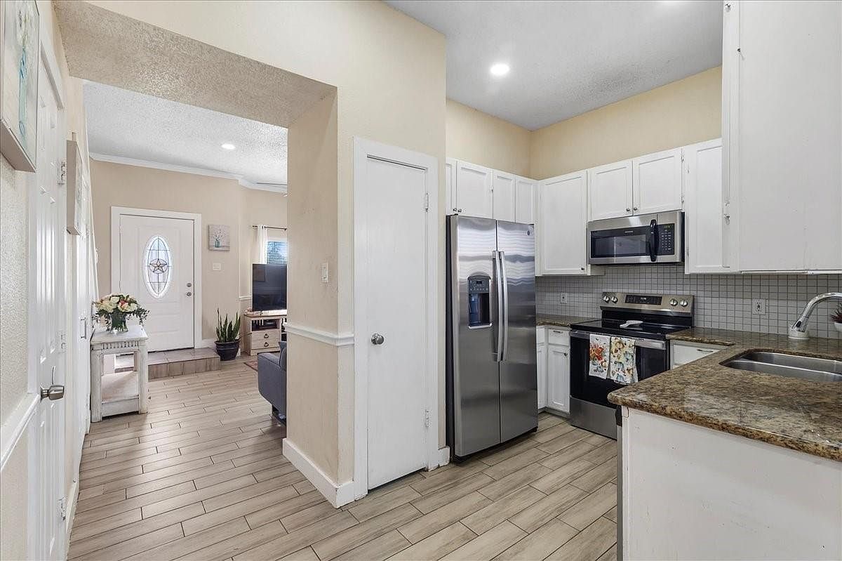 12926 Grovemill Dr Houston, TX 77045  | Single Family