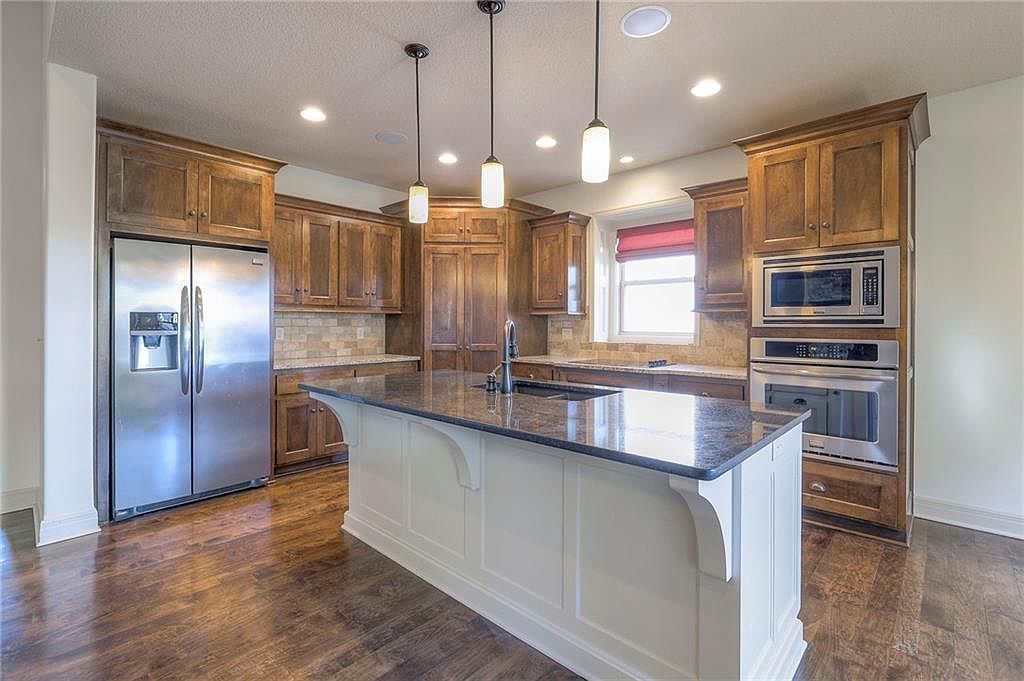 1317 NE Kenwood Dr Lees Summit, MO 64064  | Single Family