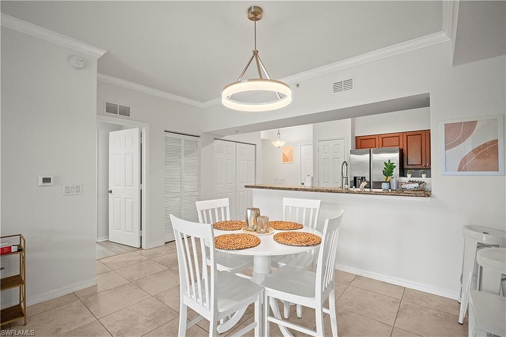 10121 Villagio Palms Way UNIT 102 Estero, FL 33928  | Condominium