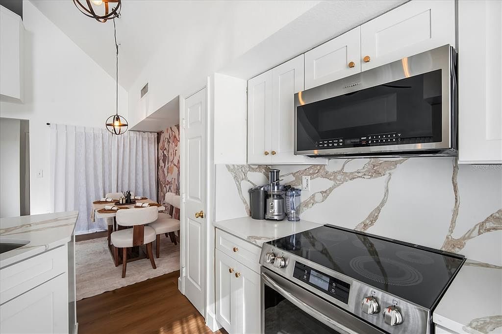 9628 Lake Chase Island Way Tampa, FL 33626  | Condominium