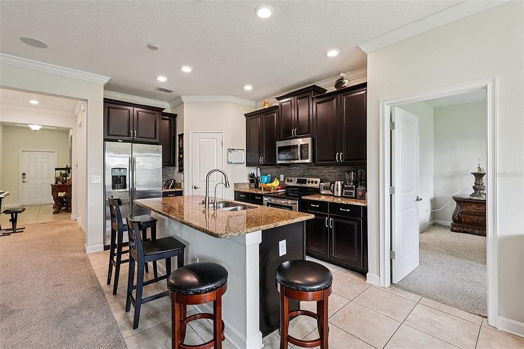 9923 Magnolia Woods Blvd Orlando, FL 32832  | Single Family