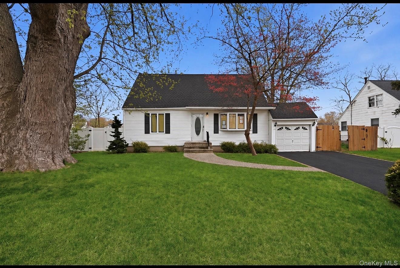 23 Woods Ln Centereach, NY 11720  | Single Family