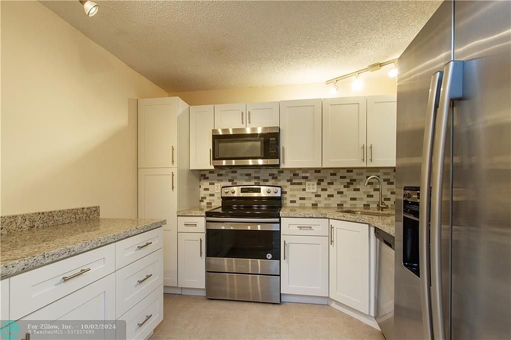 3531 Cocoplum Cir #3466 Coconut Creek, FL 33063 - Thumbnail 3