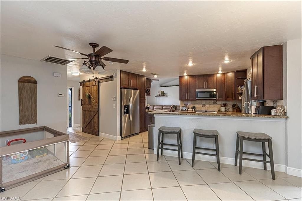 10590 Woodchuck Ln Bonita Springs, FL 34135 - Thumbnail 4