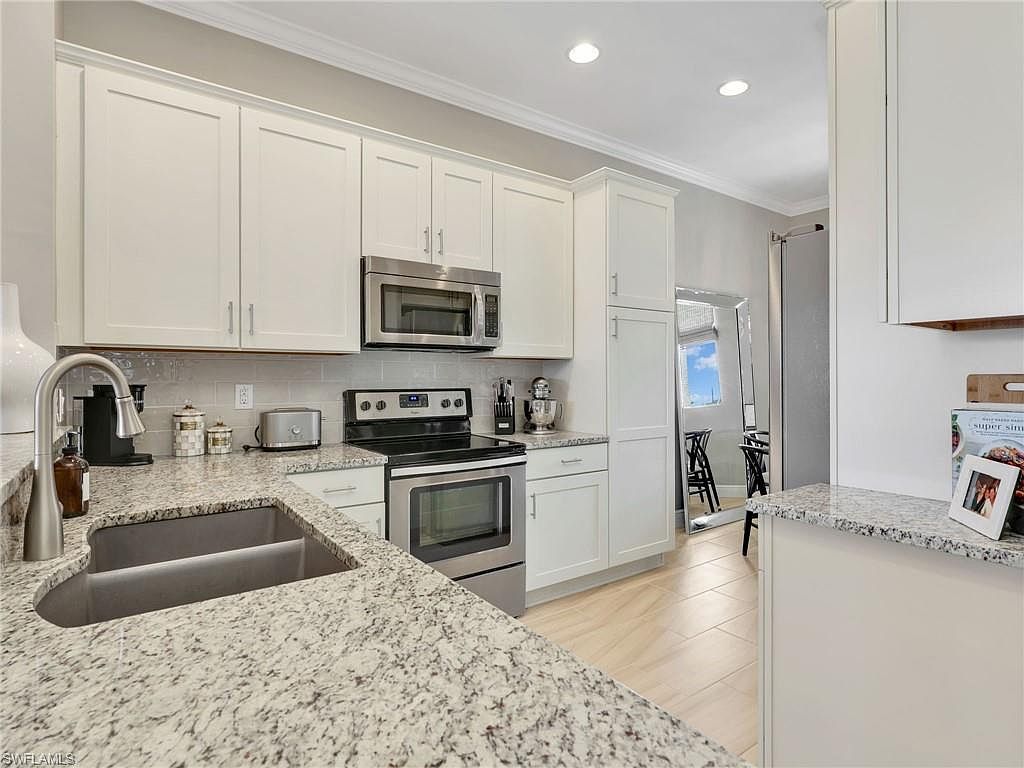 15114 Palmer Lake Cir UNIT 201 Naples, FL 34109 - Thumbnail 5