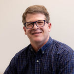 Headshot of Myan Burton, real estate agent