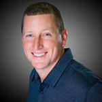 Headshot of Jon Spiva, real estate agent