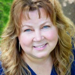 Headshot of Cassandra Chandler-Dues, real estate agent
