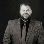 Headshot of Brandon Ferrell, real estate agent