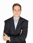 Headshot of Sandon Smith, real estate agent