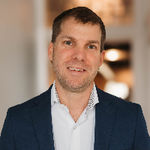 Headshot of Nate Paulus, real estate agent