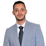 Headshot of Abdulmelik Tuhaye, real estate agent