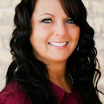 Headshot of Cherie Moore, real estate agent