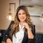Headshot of Cristina Gil, real estate agent
