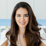 Headshot of Adriana Vergara, real estate agent