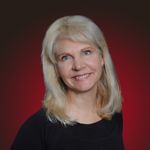 Headshot of Justyna Johnson, real estate agent