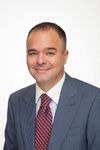 Headshot of Tony Woodfin, real estate agent