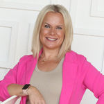 Headshot of Kelli Burau, real estate agent