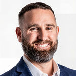 Headshot of Garrett Decker, real estate agent