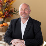 Headshot of Seth Tully, real estate agent
