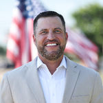 Headshot of Rommie Maxey, real estate agent