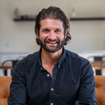 Headshot of Patrick Mencel, real estate agent