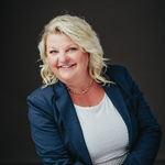 Headshot of Holly Brumm Furdo, real estate agent