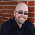 Headshot of Brian Naumann, real estate agent
