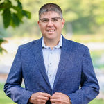 Headshot of Jason Moon, real estate agent