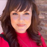 Headshot of Erin Burrell, real estate agent