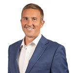 Headshot of Ian Clark, real estate agent