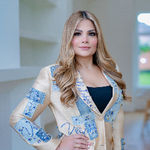 Headshot of Aida Villalobos, real estate agent