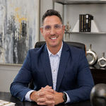 Headshot of Joseph Larsen, real estate agent