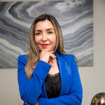 Headshot of Adriana Arizmendi, real estate agent