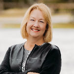 Headshot of Deana Corrigan, real estate agent