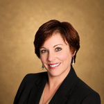 Headshot of Amy Fuchs, real estate agent