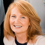 Headshot of Caroline Dugas, real estate agent