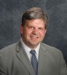 Headshot of Tom Fosnot, real estate agent