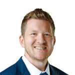 Headshot of Ben Komro, real estate agent