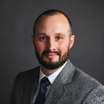 Headshot of Eric Maynard, real estate agent