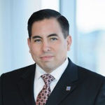 Headshot of Eric Lopez, real estate agent