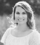 Headshot of Mandy Parker, real estate agent