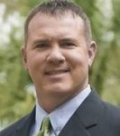 Headshot of Aaron Duncan, real estate agent