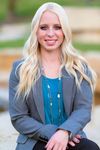 Headshot of Cas Regal, real estate agent