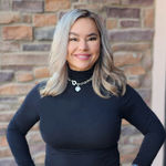 Headshot of Jenny Apodaca, real estate agent