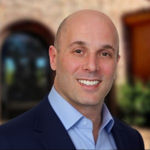 Headshot of Mark Carvalho, real estate agent