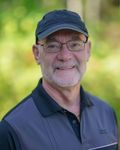 Headshot of Douglas Schlosser, real estate agent